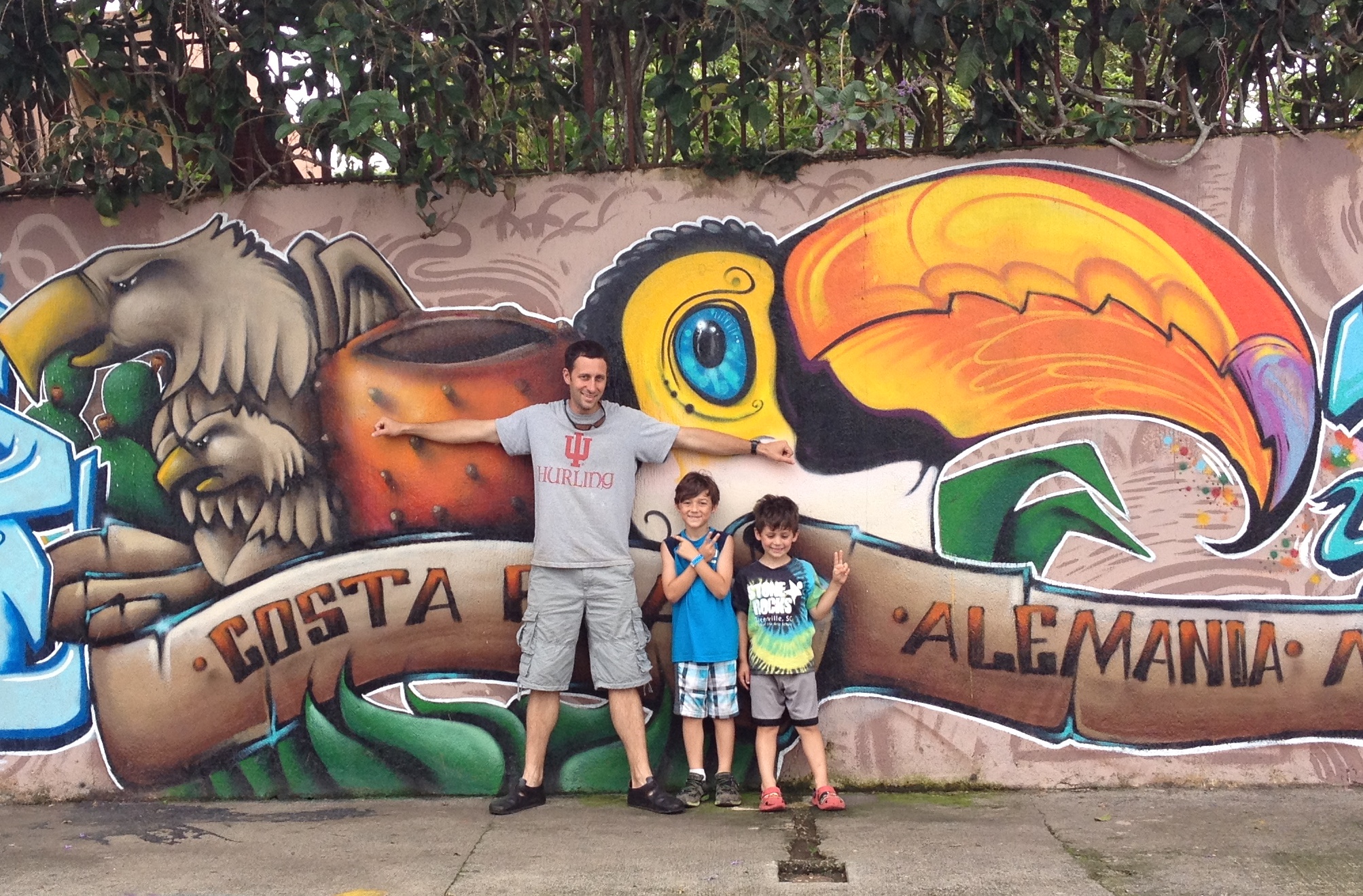 My two children and I standing in front of a mirror in Costa Rica