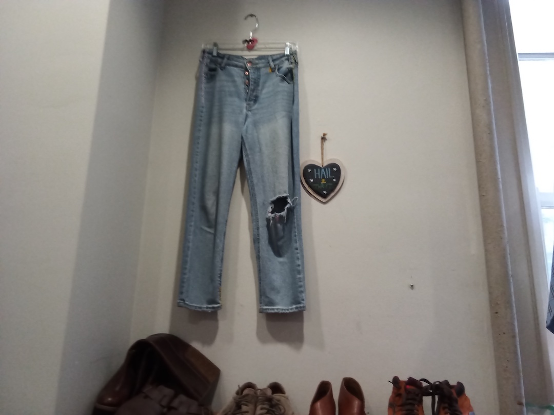 Photo of a thrift store.The thrift store provides a cheap way to buy and reuse clothes.
